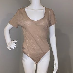 Nude “lose fitting” bodysuit